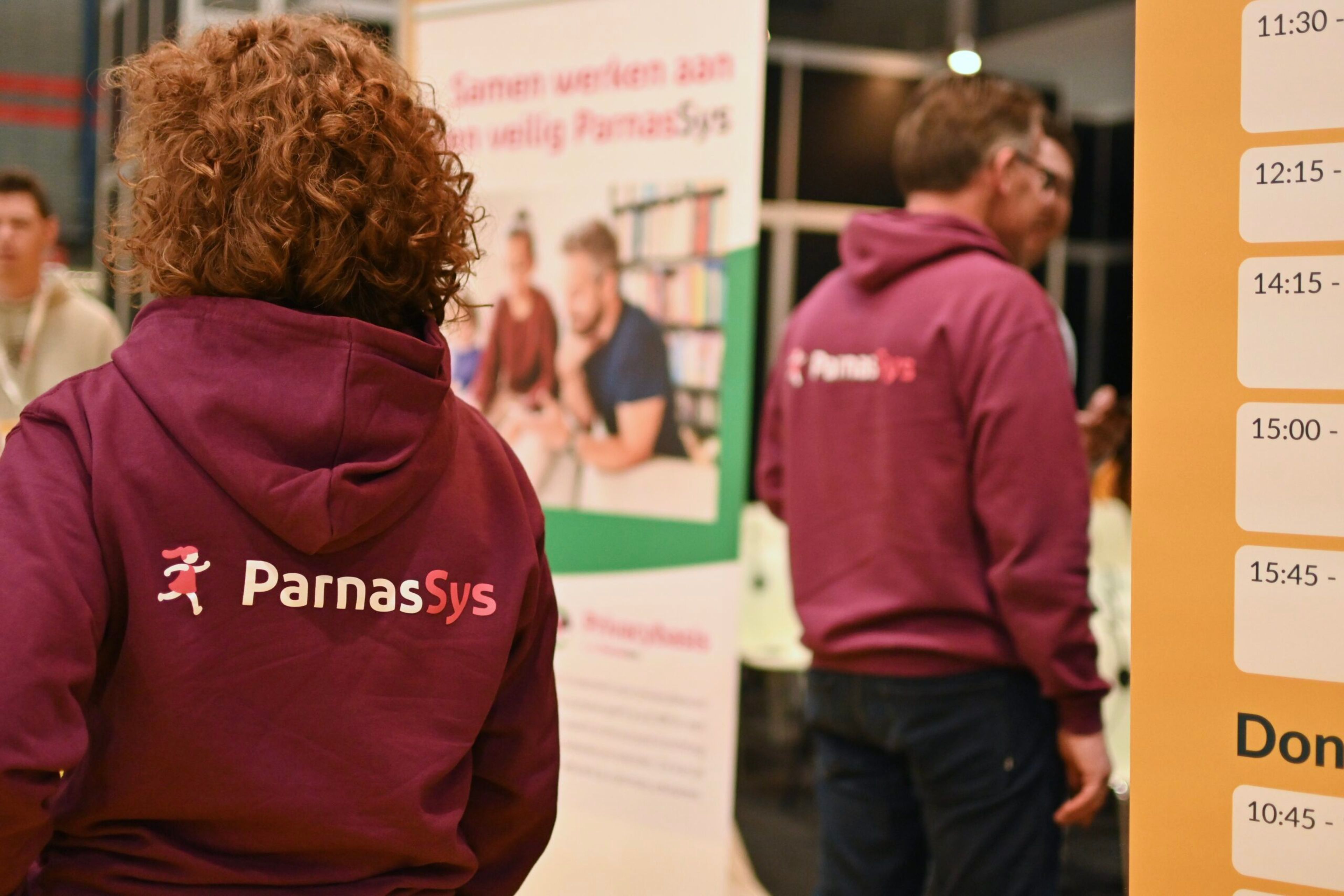 ParnasSys medewerkers op de IPON met banner