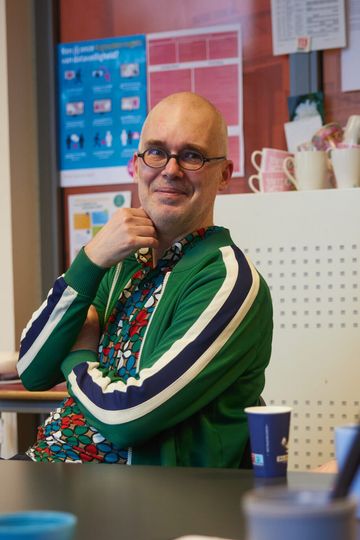 Cliënten nemen deel aan groepstherapie geleidt door verpleegers